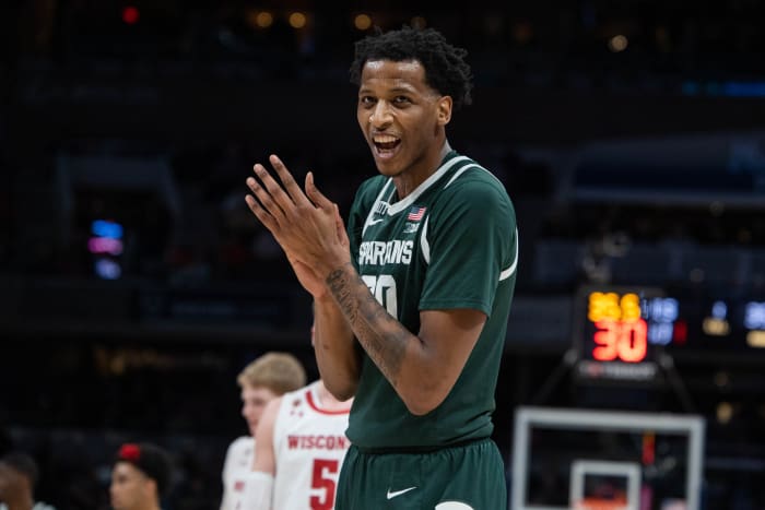 Michigan State Spartans forward Marcus Bingham Jr. (30) applauds the fans in the second half against the Wisconsin Badgers at Gainbridge Fieldhouse.